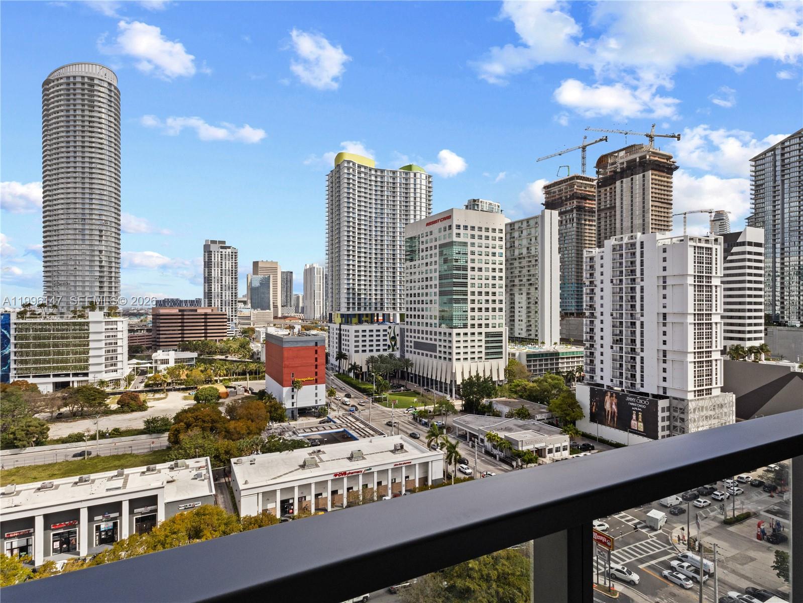 239 Southwest 9th Street, Unit 1403 Miami, FL 33130 - Photo 6 of 33 a city view with tall buildings