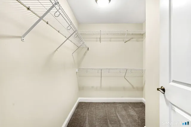 a view of a room with racks on the wall