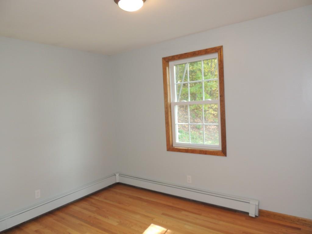 68 Cote Road Monson, MA 01057 - Photo 16 of 24 a view of a small space with wooden floor and a window