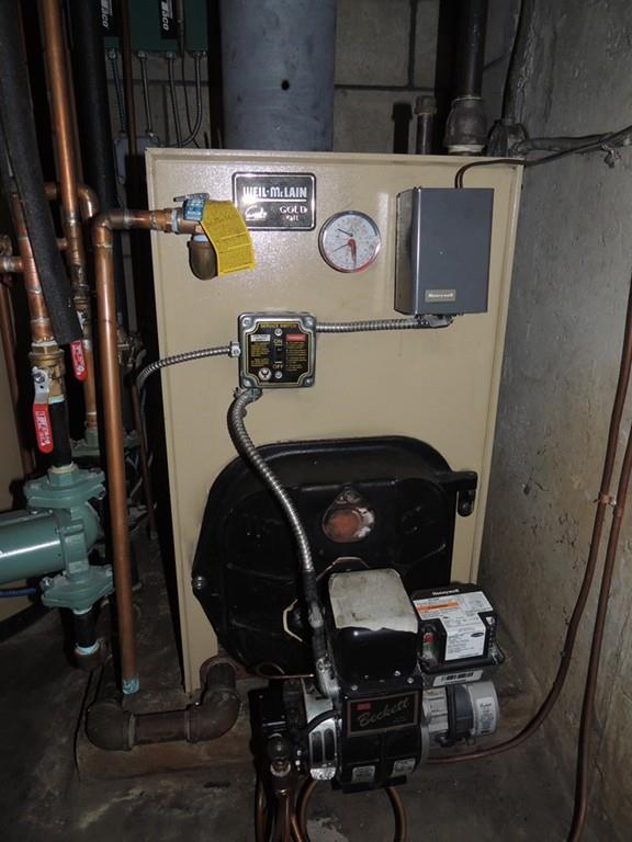 68 Cote Road Monson, MA 01057 - Photo 23 of 24 a utility room with dryer and washer