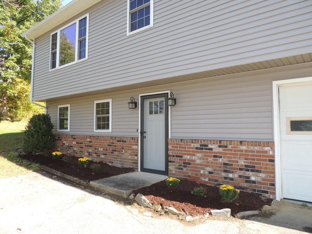68 Cote Road Monson, MA 01057 - Photo 3 of 24 a view of a house with wooden fence