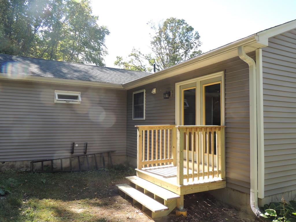 68 Cote Road Monson, MA 01057 - Photo 6 of 24 a front view of a house with a yard