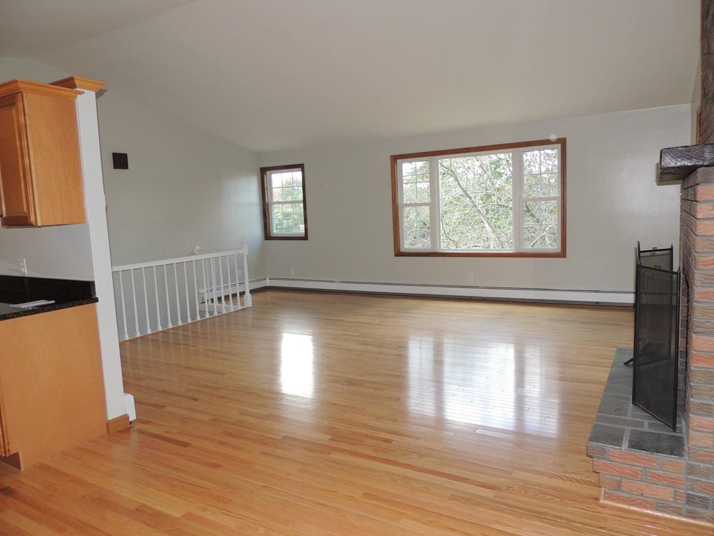 68 Cote Road Monson, MA 01057 - Photo 9 of 24 a view of an empty room with wooden floor and a window
