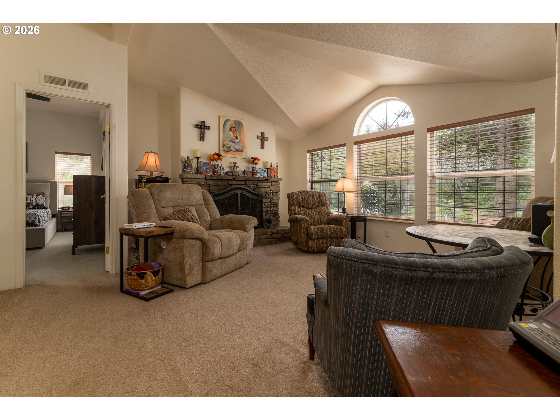 1157 8th Street Bandon, OR 97411 - Photo 20 of 46 a living room with furniture and a large window