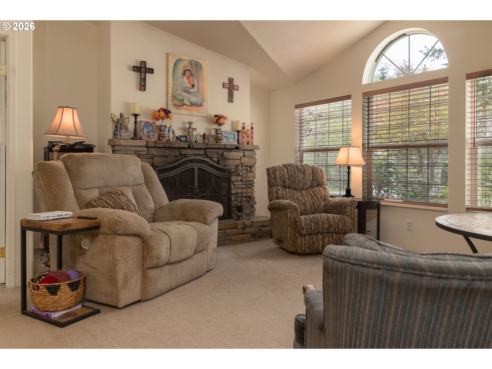 1157 8th Street Bandon, OR 97411 - Photo 21 of 46 a living room with furniture fireplace and a large window