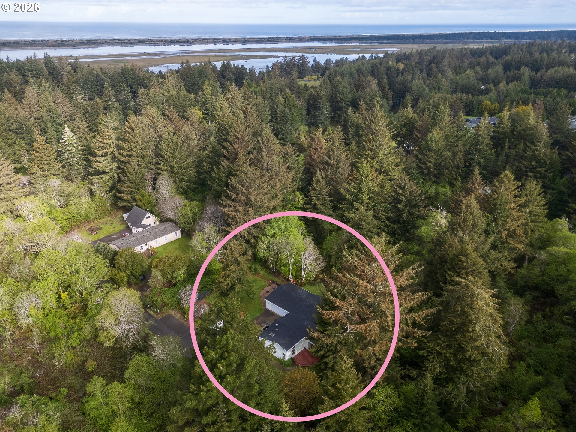 1157 8th Street Bandon, OR 97411 - Photo 46 of 46 a view of a swimming pool with a yard