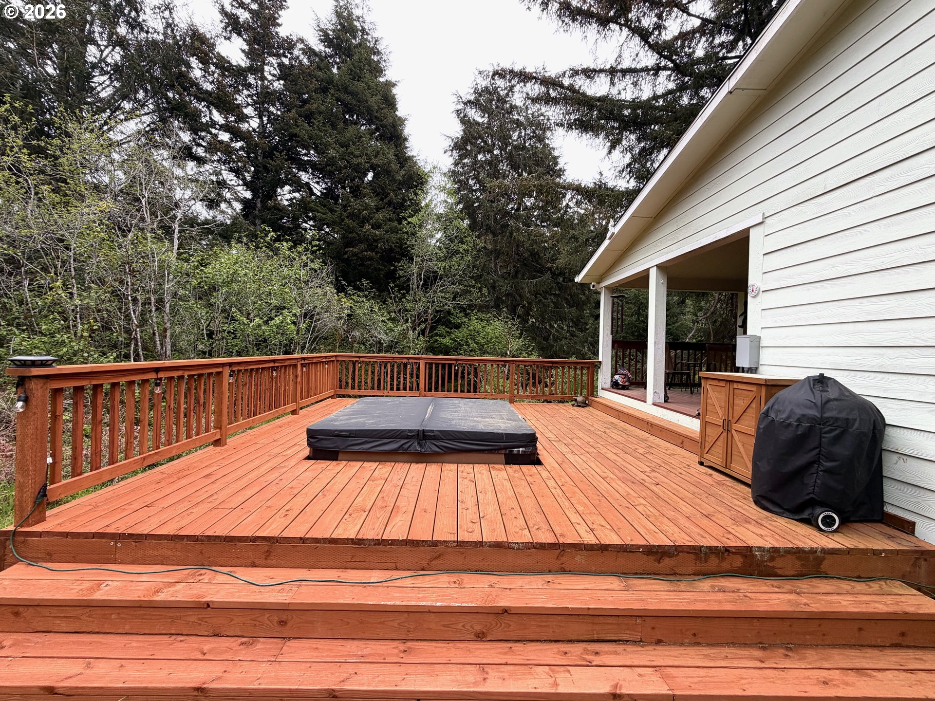 1157 8th Street Bandon, OR 97411 - Photo 7 of 46 a view of deck with patio