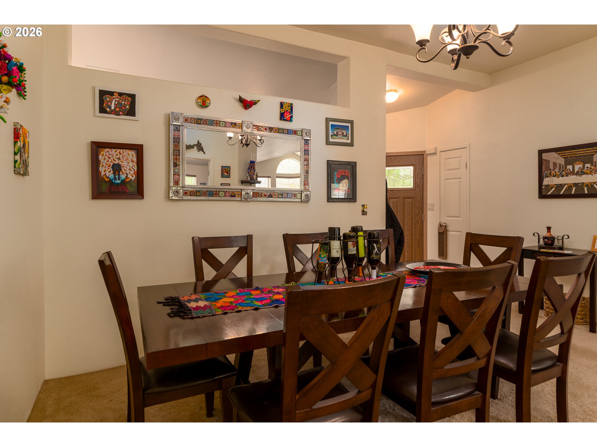 1157 8th Street Bandon, OR 97411 - Photo 10 of 46 a view of a dining room with furniture and wooden floor