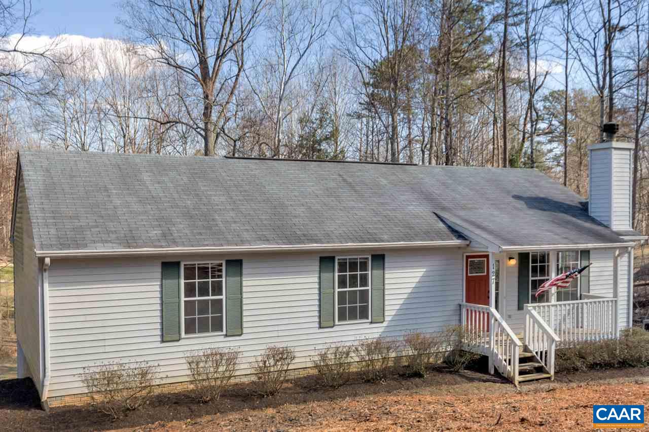 127 Larkspur Road Ruckersville, VA 22968 - Photo 2 of 29 a front view of a house with garden