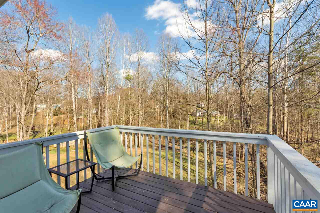 127 Larkspur Road Ruckersville, VA 22968 - Photo 26 of 29 a view of a balcony with wooden floor and fence