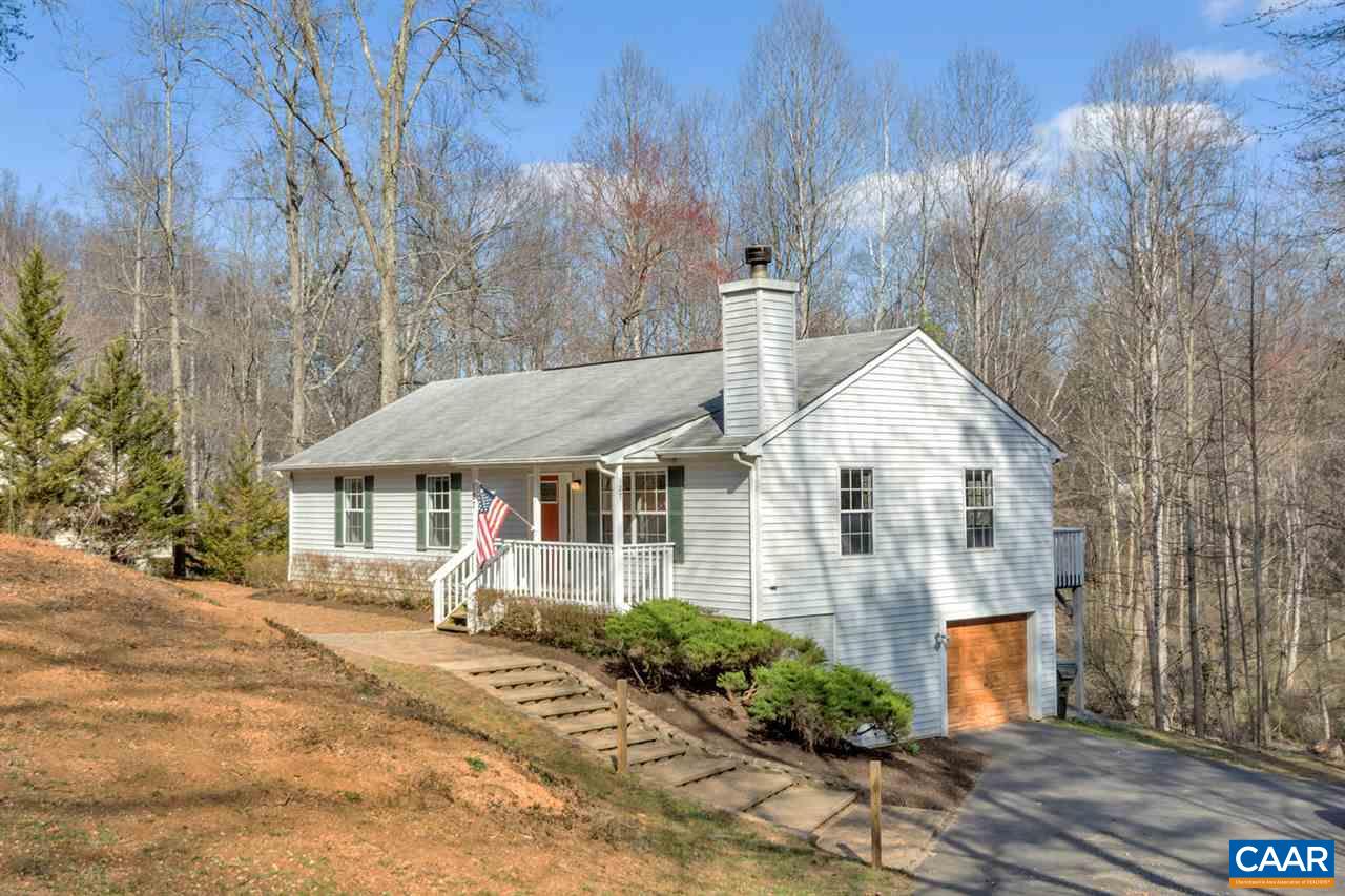 127 Larkspur Road Ruckersville, VA 22968 - Photo 3 of 29 a front view of a house with garden