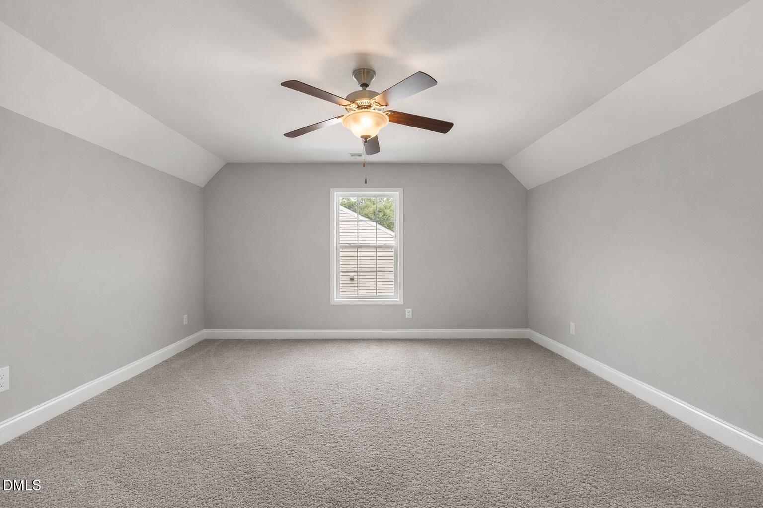 3401 Grosbeak Way Raleigh, NC 27616 - Photo 10 of 13 wooden floor in an empty room with a window