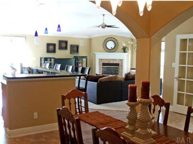 10096 Rookery Road Pensacola, FL 32507 - Photo 5 of 13 View from Dining Room to Kitchen & Great Room