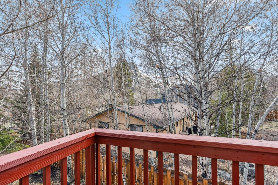 209 Miners Creek Road Frisco, CO 80443 - Photo 26 of 32 a view of trees and deck in the background