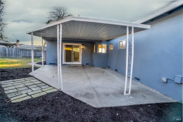 a view of a porch with a yard