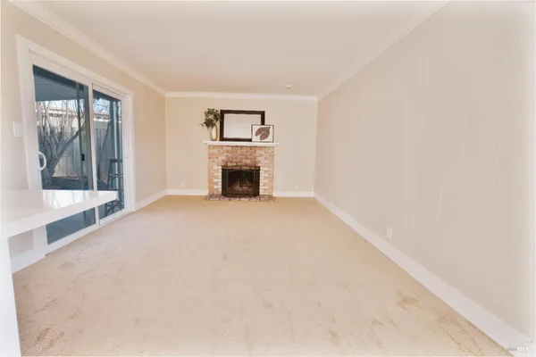 a view of livingroom with a fireplace