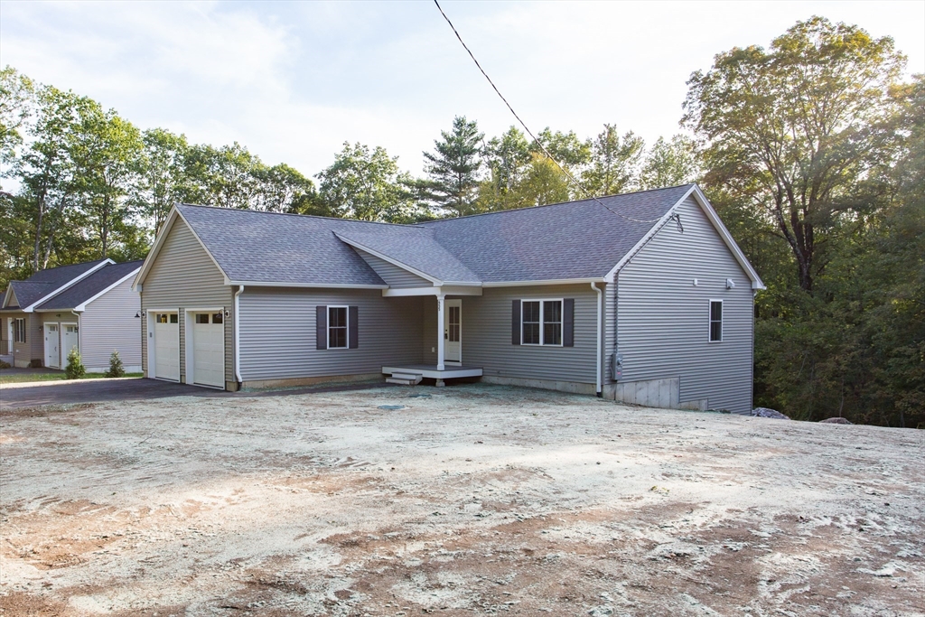 455 Cronin Road West Brookfield, MA 01585 - Photo 2 of 35 a house that has a tree in front of it