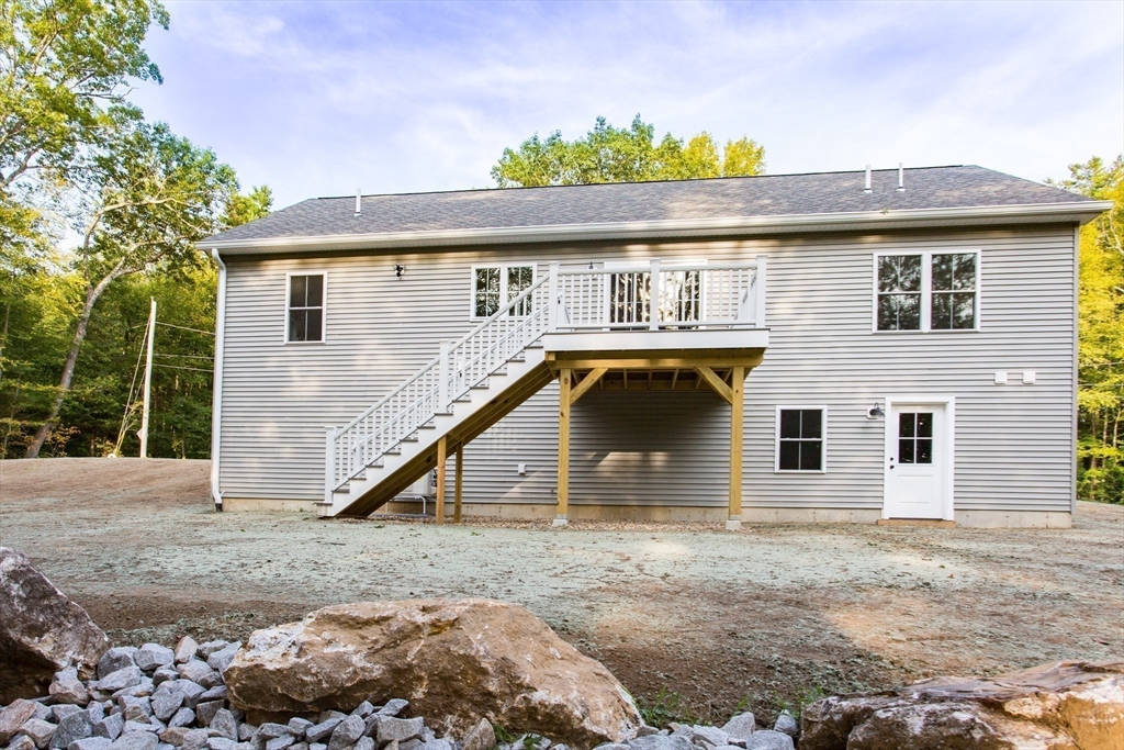 455 Cronin Road West Brookfield, MA 01585 - Photo 35 of 35 a view of a house with a backyard