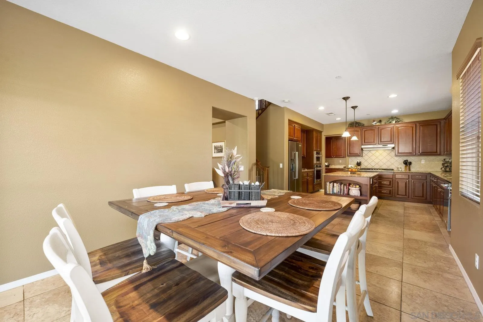 5545 Nanday Court Oceanside, CA 92057 - Photo 16 of 38 a view of a dining room with furniture