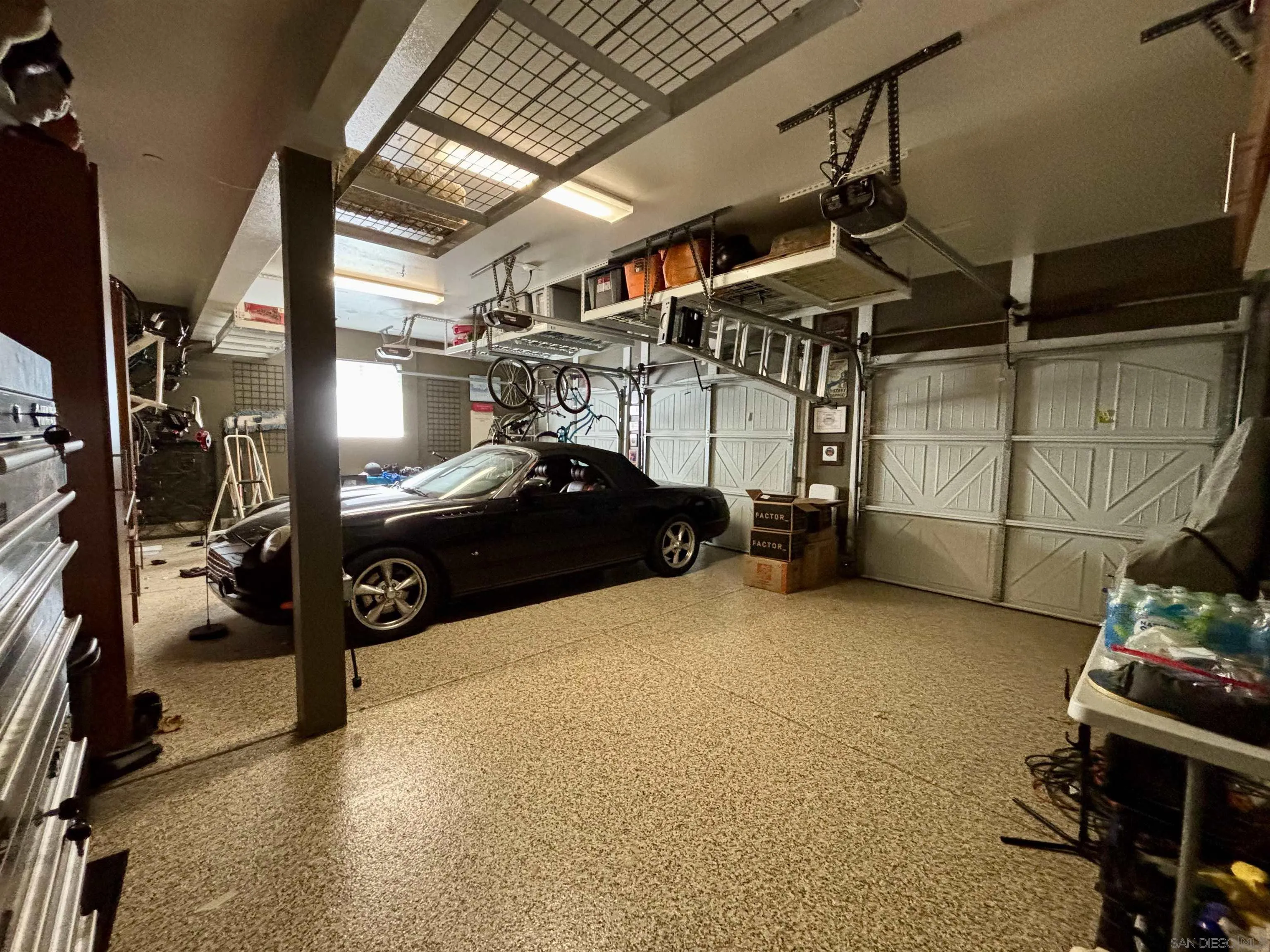 5545 Nanday Court Oceanside, CA 92057 - Photo 37 of 38 a view of a garage with storage