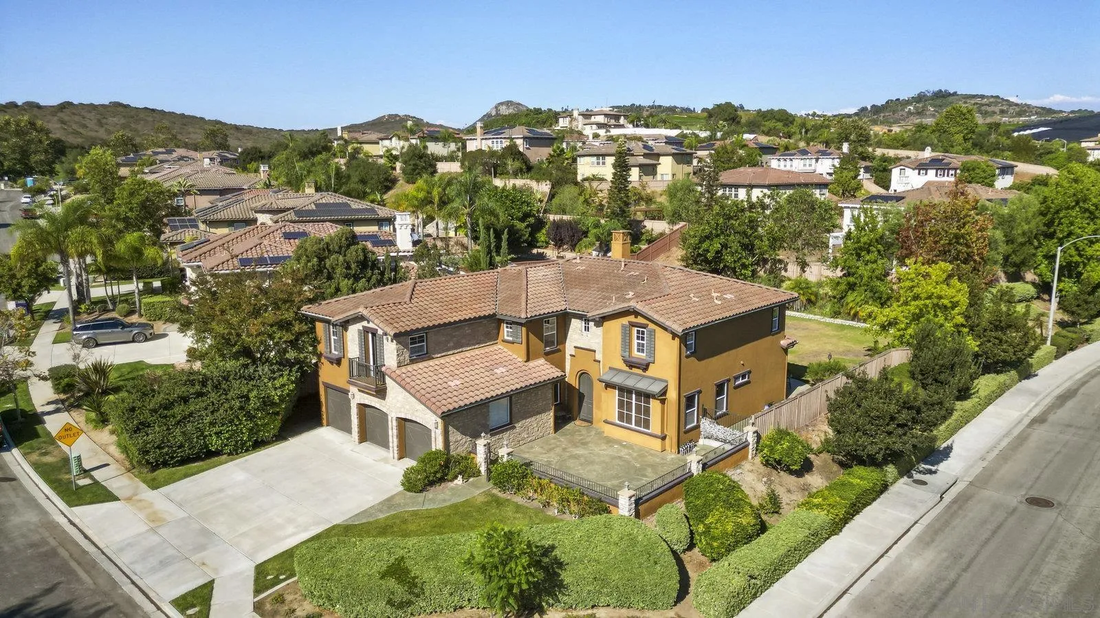5545 Nanday Court Oceanside, CA 92057 - Photo 4 of 38 an aerial view of residential houses with outdoor space and trees