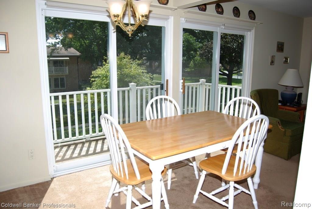 1199 South Sheldon Road, Unit 41 Plymouth, MI 48170 - Photo 10 of 17 Dining Room with doorwall to balcony