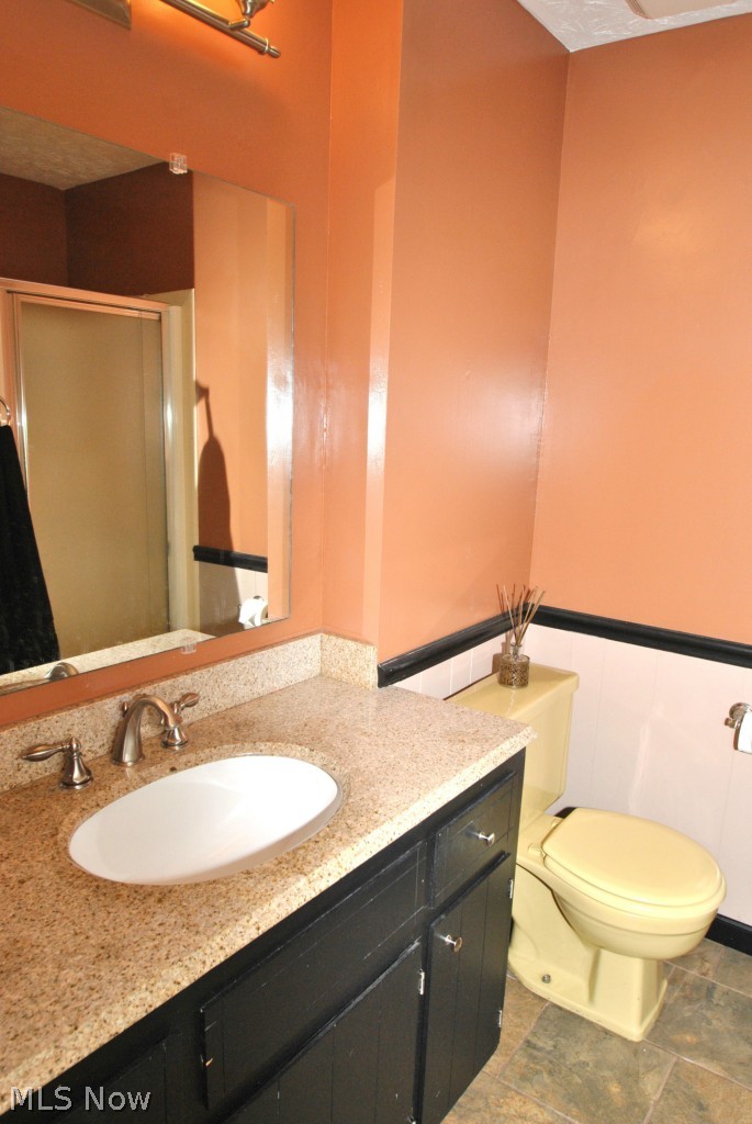 304 South Hametown Road Akron, OH 44321 - Photo 14 of 16 Lower level full bath has granite counter and shower stall.