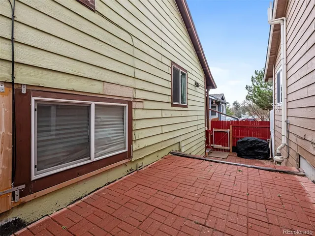 a view of balcony with wooden floor