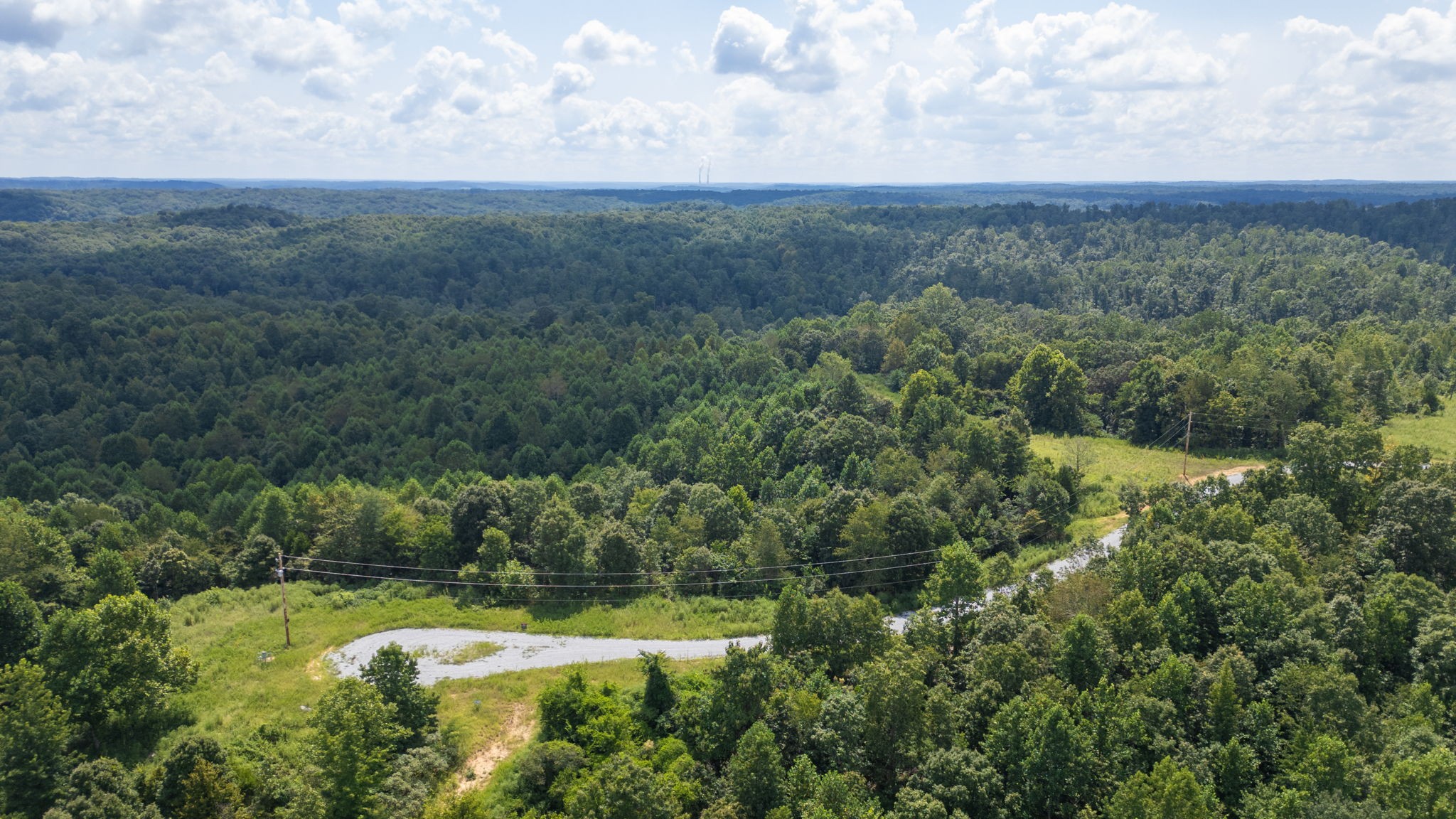 0 Topside Drive Dover, TN 37058 - Photo 3 of 38 a view of a city with lush green forest