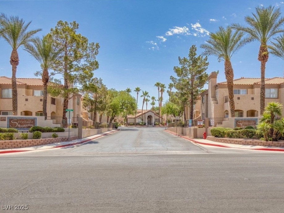 1851 Hillpointe Road, Unit 2124 Henderson, NV 89074 - Photo 24 of 24 View of road with curbs, sidewalks, and a residential view