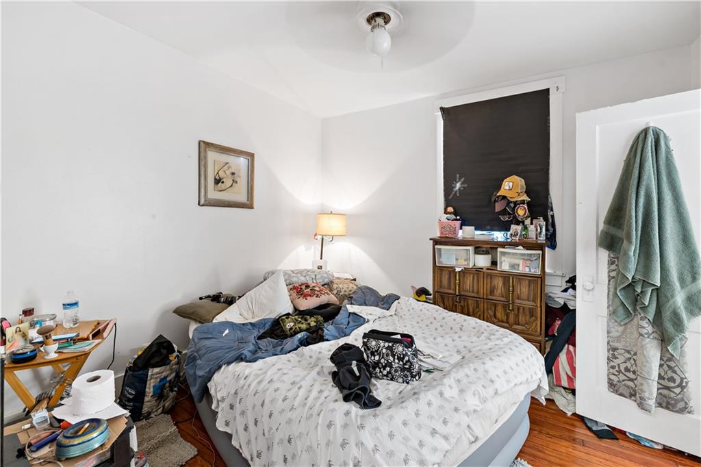 1210 Holmes Street McKees Rocks, PA 15136 - Photo 19 of 44 a living room with furniture and a window