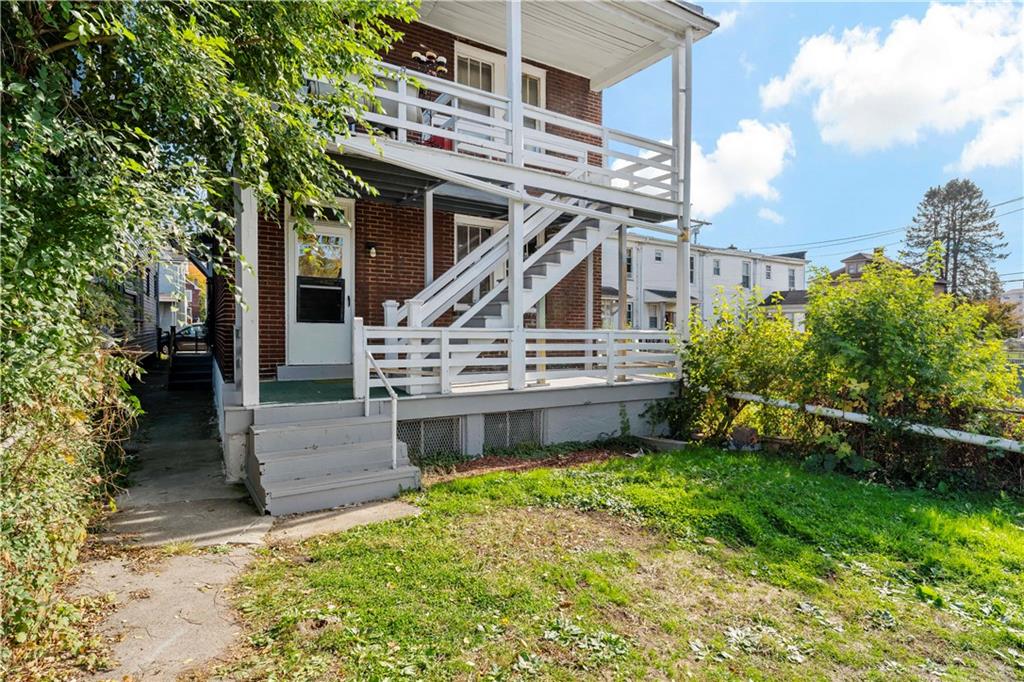 1210 Holmes Street McKees Rocks, PA 15136 - Photo 27 of 44 a view of a house with a yard patio and a patio