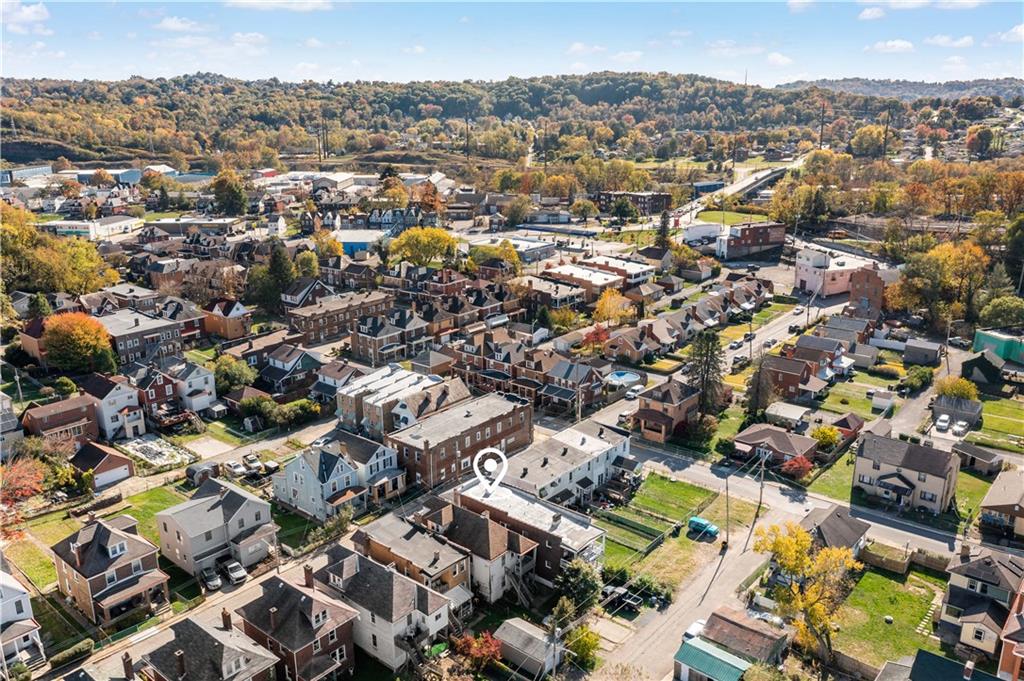 1210 Holmes Street McKees Rocks, PA 15136 - Photo 33 of 44 an aerial view of residential houses with outdoor space
