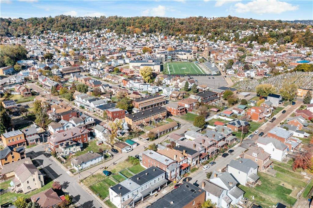 1210 Holmes Street McKees Rocks, PA 15136 - Photo 36 of 44 an aerial view of residential building with green space