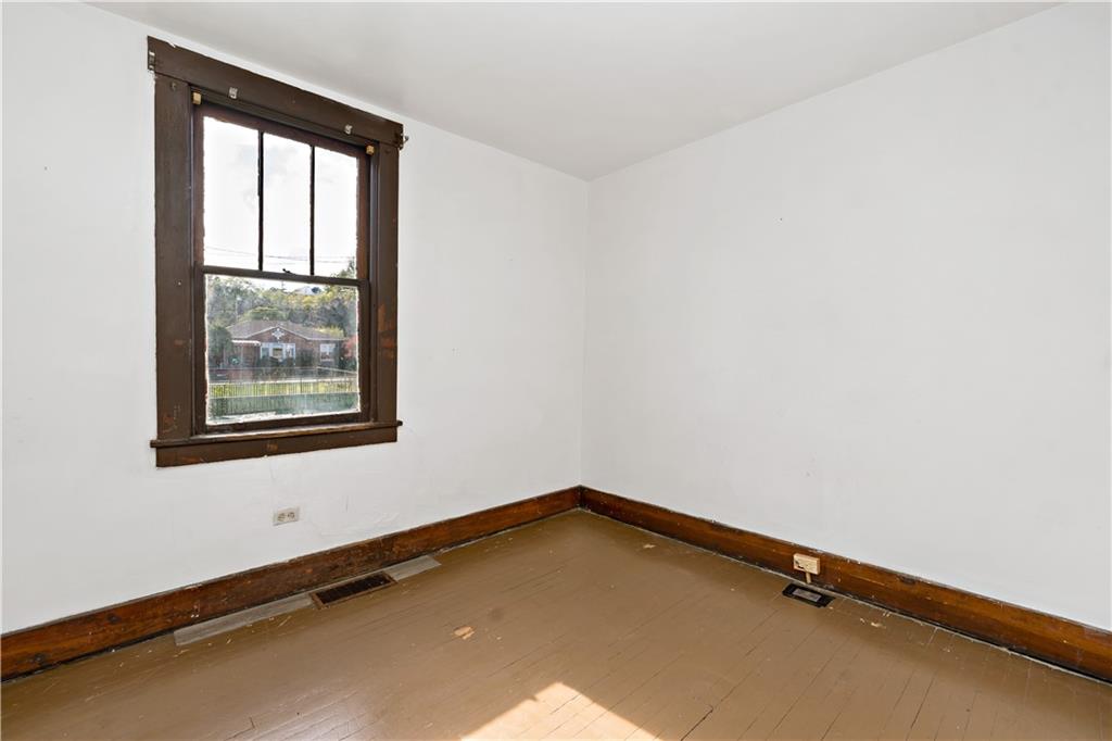 1210 Holmes Street McKees Rocks, PA 15136 - Photo 10 of 44 a room with a window
