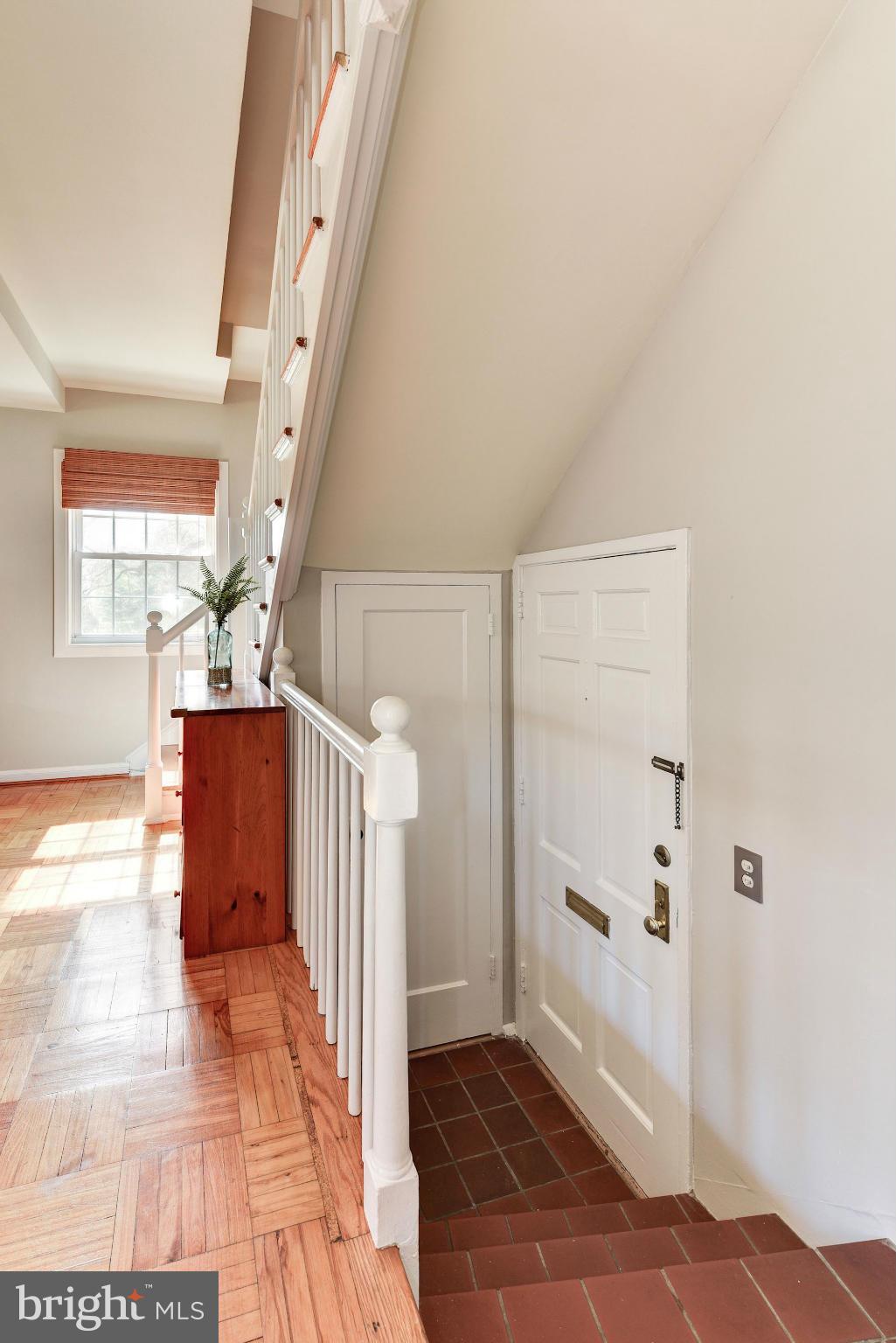1621 Preston Road Alexandria, VA 22302 - Photo 4 of 30 a view of a hallway view with wooden floor and staircase