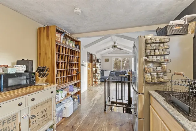 a view of a kitchen and dining room