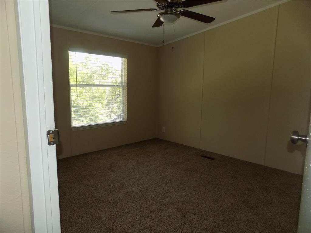 203 South Ridgeview Court Azle, TX 76020 - Photo 14 of 29 One of 4 secondary bedrooms.