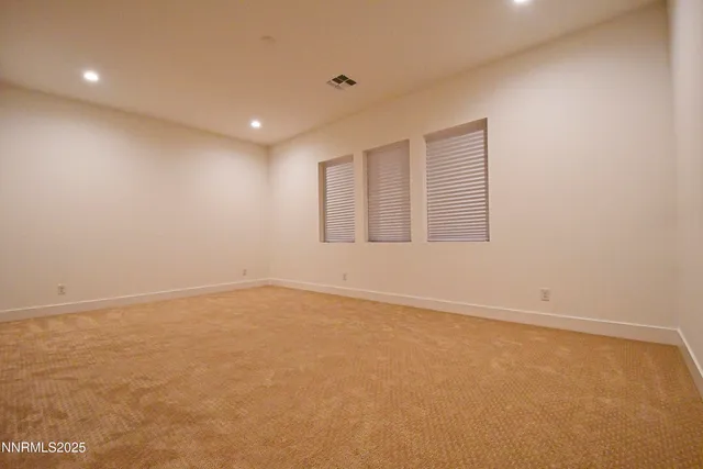 an empty room with a empty room and a window