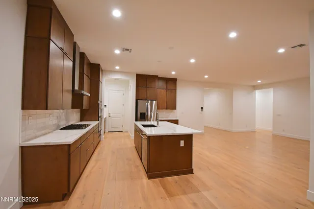 a bathroom with a sink a vanity and a mirror