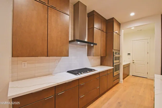 a bathroom with a sink a mirror and a bathtub