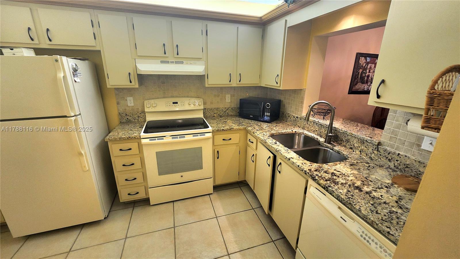 2955 Southwest 22nd Avenue, Unit 1040 Delray Beach, FL 33445 - Photo 10 of 27 a utility room with dryer and washer