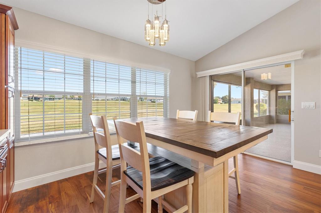 11735 Southeast 174th Loop Summerfield, FL 34491 - Photo 16 of 61 a view of a dining room with furniture window and outside view