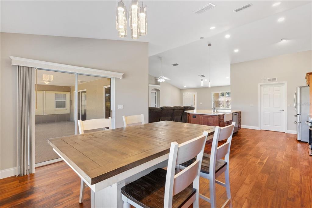 11735 Southeast 174th Loop Summerfield, FL 34491 - Photo 17 of 61 a view of kitchen with cabinets and wooden floor
