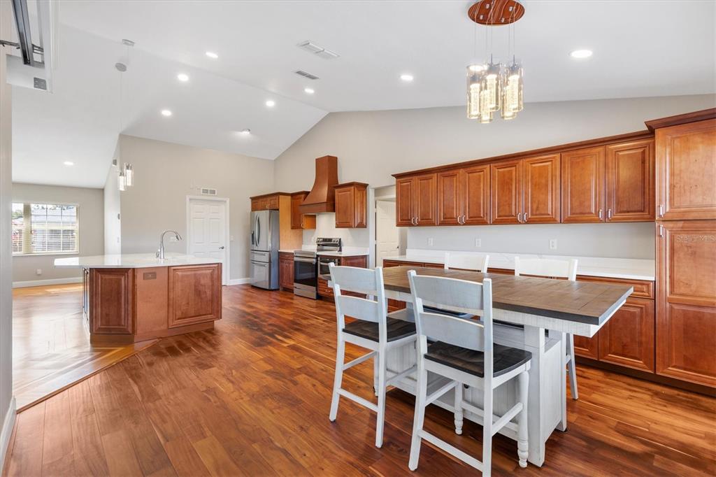 11735 Southeast 174th Loop Summerfield, FL 34491 - Photo 18 of 61 a view of kitchen with cabinets and wooden floor