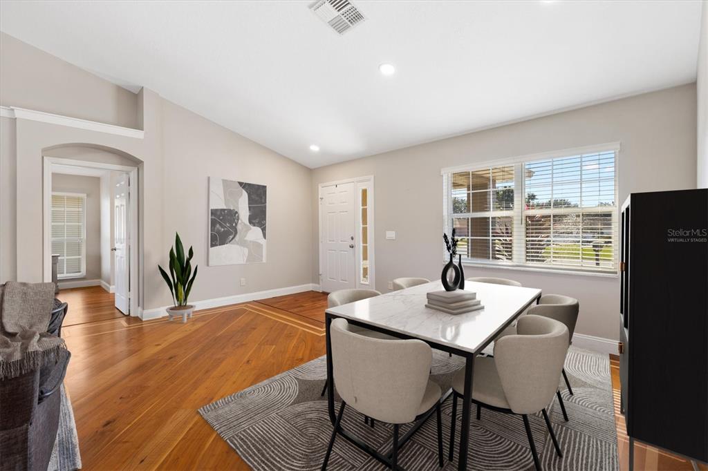 11735 Southeast 174th Loop Summerfield, FL 34491 - Photo 2 of 61 a dining room with furniture and window