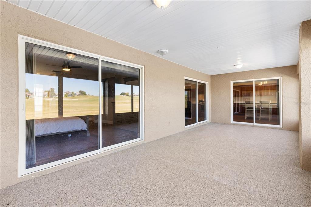 11735 Southeast 174th Loop Summerfield, FL 34491 - Photo 31 of 61 an empty room with walk in closet and large windows