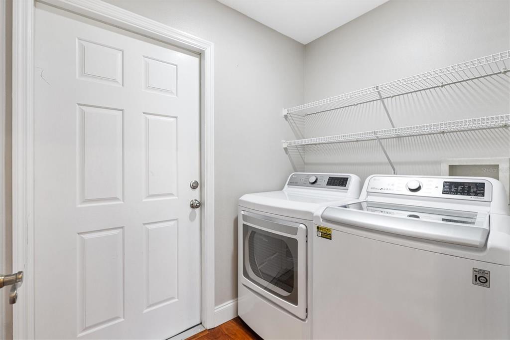 11735 Southeast 174th Loop Summerfield, FL 34491 - Photo 34 of 61 a utility room with dryer and washer