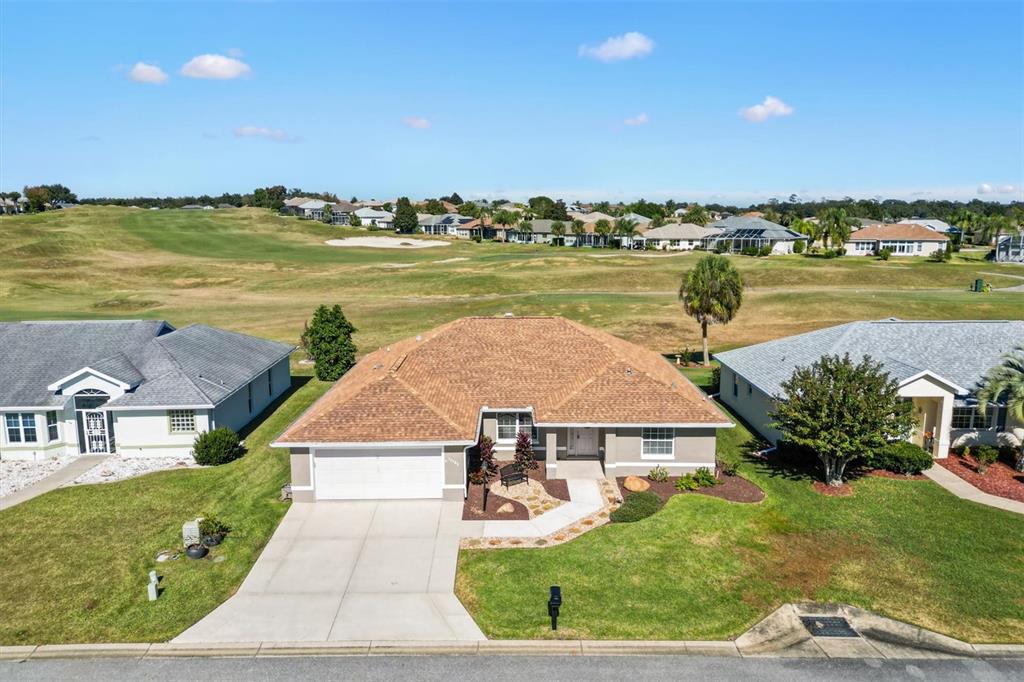 11735 Southeast 174th Loop Summerfield, FL 34491 - Photo 45 of 61 an aerial view of residential houses with outdoor space and ocean view