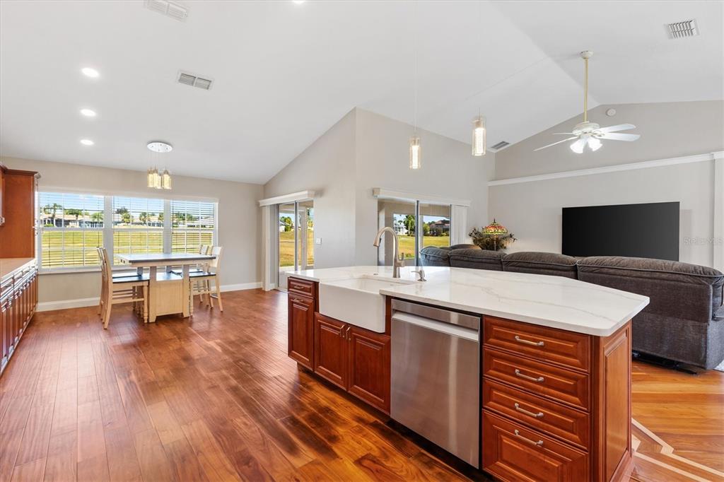 11735 Southeast 174th Loop Summerfield, FL 34491 - Photo 10 of 61 a large kitchen with a table and chairs